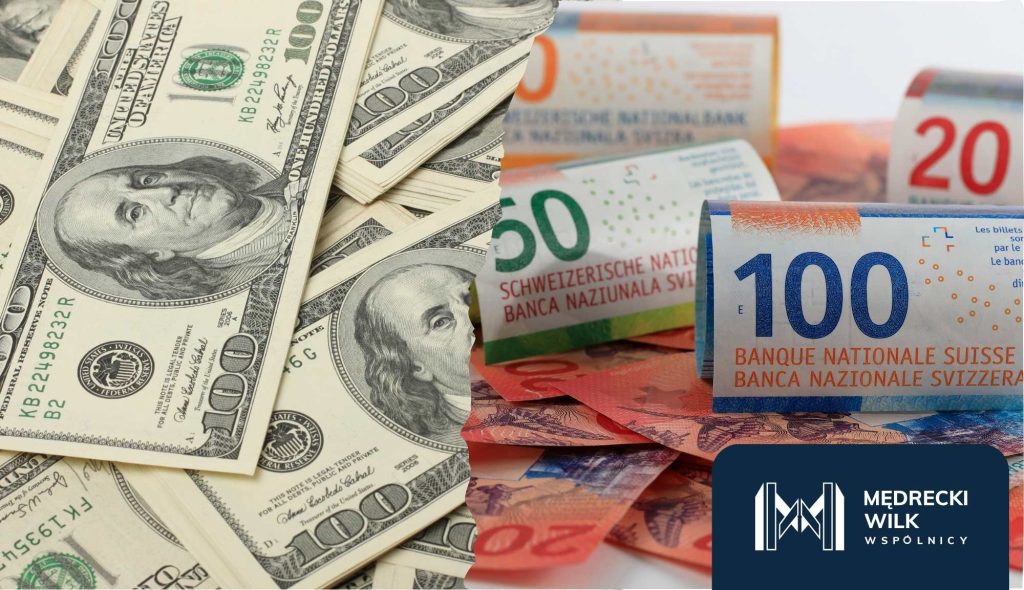 Zbliżenie na banknoty dolarowe i franki szwajcarskie – sprawy walutowe CHF i USD prowadzone przez kancelarię w Poznaniu.