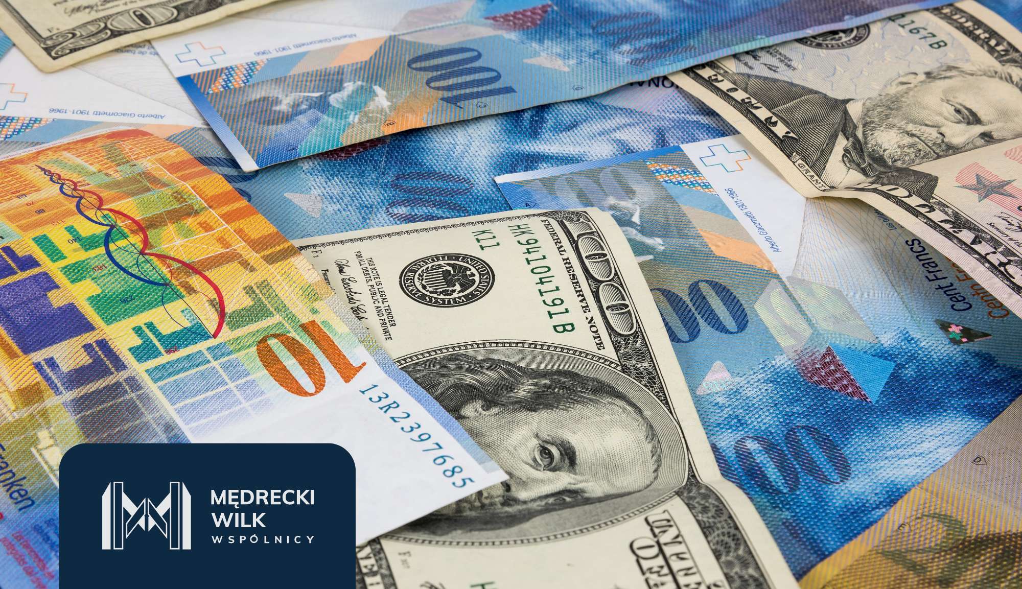 Pile of colorful banknotes from multiple currencies with a blue company logo overlay in the corner.